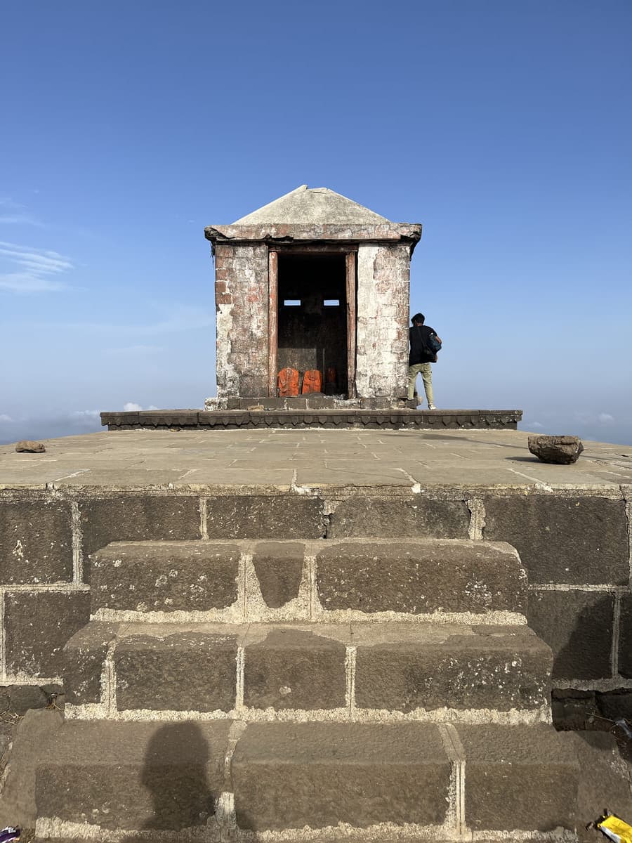 The Parshuram temple on the summit of Salher Fort, square with a triangular stone dome